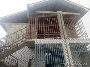 PARCELLE AVEC IMMEUBLE TYPE LOCATAIRES