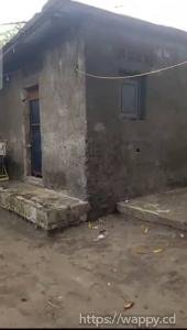 Parcelle avec deux maisons de locataires