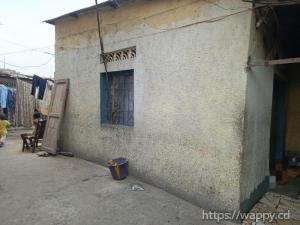 PARCELLE À BARUMBU AVEC MAISON DE 3 CHAMBRES